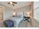 Cozy bedroom featuring a comfortable bed, soft lighting, and neutral décor at 6237 Fish Eagle Ct, Nokomis, FL 34275