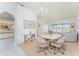 Cozy dining room next to the kitchen with an abundance of natural light at 11453 Oceanspray Blvd, Englewood, FL 34224