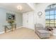Welcoming foyer with a chandelier, front door, and decorative wall art at 11453 Oceanspray Blvd, Englewood, FL 34224