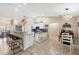 Bright eat-in kitchen with breakfast bar and granite counters at 12028 Newgate Ave, Port Charlotte, FL 33981