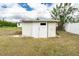 Exterior view of the home's storage shed at 13360 Foresman Blvd, Port Charlotte, FL 33981