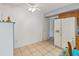 Bright kitchen with tile floors, a white refrigerator, and ample space, ideal for cooking and entertaining at 13559 Martha Ave, Port Charlotte, FL 33981