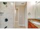 Bathroom featuring granite vanity, walk in shower, and tile flooring at 14795 San Domingo Blvd, Port Charlotte, FL 33981