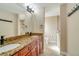 Bathroom features a double sink vanity with granite countertops and tile flooring at 14795 San Domingo Blvd, Port Charlotte, FL 33981