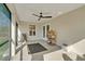 Covered patio with a ceiling fan, perfect for enjoying the outdoors at 14795 San Domingo Blvd, Port Charlotte, FL 33981