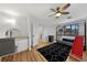 Bedroom featuring wood floors, bunk beds, neutral paint and black & white rug at 18 Pebble Beach Road, Rotonda West, FL 33947