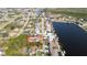 Aerial view of home featuring fenced in back yard with pool and adjacent canal at 18970 Mcgrath Cir, Port Charlotte, FL 33948