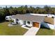 Charming single-story home with well-manicured lawn, RV parking, above ground pool and white privacy fence at 18970 Mcgrath Cir, Port Charlotte, FL 33948