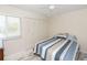 Inviting bedroom with a closet, window, and cozy decor at 18970 Mcgrath Cir, Port Charlotte, FL 33948