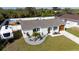 Charming single-story home with well-manicured lawn, RV parking, above ground pool and white privacy fence at 18970 Mcgrath Cir, Port Charlotte, FL 33948