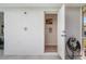 Pool access bathroom featuring outdoor shower and easy access to the house for added convenience at 194 Sunset Rd, Rotonda West, FL 33947