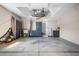 Spacious two car garage with finished ceiling, neutral paint, cabinets and plenty of storage space at 194 Sunset Rd, Rotonda West, FL 33947
