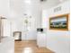 Bright and airy kitchen featuring white cabinets, stainless steel appliances, and a stylish countertop at 205 Sand Dollar Ln, Englewood, FL 34223