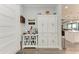 Entryway featuring white cabinets, decor, and an open view into the living area at 237 W Pine Valley Ln, Rotonda West, FL 33947