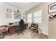 Office space with a traditional desk, built-in shelving, and a comfortable ergonomic chair at 237 W Pine Valley Ln, Rotonda West, FL 33947