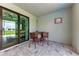 Covered patio with bar seating, perfect for entertaining guests outdoors at 237 W Pine Valley Ln, Rotonda West, FL 33947