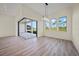 Light and airy dining room with a sliding glass door to the outdoor living space at 443 Boundary Blvd, Rotonda West, FL 33947