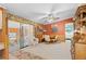 Bright breakfast nook area with sliding glass doors leading to the patio at 5703 Holiday Park Blvd, North Port, FL 34287