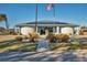 The Lakeside Club is a single story building with a well maintained yard at 8436 Buttonquail Dr, Englewood, FL 34224