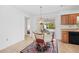 Bright dining area with pendant lighting and a view of the pool at 975 Clearview Dr, Port Charlotte, FL 33953