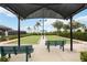 Beautiful bocce ball courts with seating, covered areas, and manicured landscaping for a relaxing community experience at 10508 Crooked Creek Dr, Venice, FL 34293