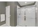 Contemporary bathroom showcasing a glass-enclosed shower with updated fixtures and clean design at 10508 Crooked Creek Dr, Venice, FL 34293