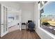 Bright office space featuring french doors and wood look flooring at 14157 Kewanee Ln, Port Charlotte, FL 33981