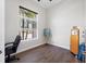 Bright home office with wood floors and vintage gas pump at 14157 Kewanee Ln, Port Charlotte, FL 33981