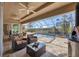 The outdoor patio has plenty of furniture and views of the pool at 14157 Kewanee Ln, Port Charlotte, FL 33981