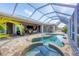 Enclosed pool and patio area, ideal for outdoor entertaining at 14157 Kewanee Ln, Port Charlotte, FL 33981
