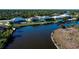 Aerial view of homes on canal with private docks and boat lifts at 14718 San Domingo Blvd, Port Charlotte, FL 33981