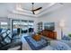 Comfortable living room offering an expansive view of the water, stylish decor, and ample natural light at 14718 San Domingo Blvd, Port Charlotte, FL 33981