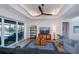 Cozy living room featuring a waterfront view, tasteful decor, and comfortable seating arrangements at 14718 San Domingo Blvd, Port Charlotte, FL 33981