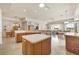 Open kitchen with island and seamless transition to the dining and living areas, great for entertaining at 16 Windward Ter, Placida, FL 33946