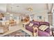 Bright and airy living room with tile floors, open to the kitchen and dining areas, perfect for entertaining at 16 Windward Ter, Placida, FL 33946