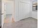 Bedroom featuring closet space and a view into other rooms at 1602 Saddlewood Cir, Port Charlotte, FL 33953
