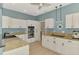 Spacious kitchen boasts granite counters, white cabinetry, stainless steel appliances, and recessed lighting at 17 Dominica Dr, Englewood, FL 34223