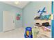 Tidy laundry room with convenient access to the adjacent bathroom at 17 Dominica Dr, Englewood, FL 34223