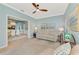 Open-concept layout showcasing the living room with easy access to the adjacent dining area and kitchen at 17 Dominica Dr, Englewood, FL 34223
