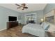 A calm and spacious main bedroom featuring patio access and ample natural light at 17 Dominica Dr, Englewood, FL 34223