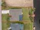 Stunning aerial view showcases the home's layout, backyard, and access to the canal at 184 Eppinger Dr, Port Charlotte, FL 33953