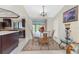 Cozy dining area adjacent to the kitchen with views of the backyard pool at 184 Eppinger Dr, Port Charlotte, FL 33953