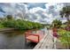 Dock featuring scenic waterfront views and offering opportunities for boating and water activities at 184 Eppinger Dr, Port Charlotte, FL 33953