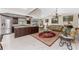 Open-concept living area with kitchen island, stainless appliances, and formal living room at 184 Eppinger Dr, Port Charlotte, FL 33953