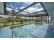 Sparkling screened-in swimming pool with clear water and a calming backyard view at 184 Eppinger Dr, Port Charlotte, FL 33953