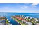 An elevated shot showcasing waterfront homes with private boat docks along a scenic canal and bay at 2160 Palm Tree Dr, Punta Gorda, FL 33950