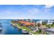 Overhead view showcasing waterfront houses with private docks, canals and tranquil atmosphere under a sunny sky at 2160 Palm Tree Dr, Punta Gorda, FL 33950