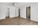Bedroom boasts wood floors and direct access to bathroom at 2160 Palm Tree Dr, Punta Gorda, FL 33950