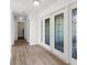 Entryway showing the door and the floors at 2160 Palm Tree Dr, Punta Gorda, FL 33950