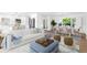 Bright, open-concept living room featuring stylish decor, modern lighting, and seamless flow to the kitchen and dining area at 2160 Palm Tree Dr, Punta Gorda, FL 33950